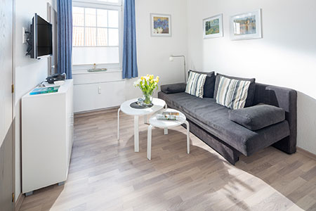 Wohnraum Fewo 13, Appartementhaus am Kurpark