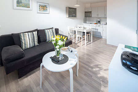 Wohnraum Fewo 13, Appartementhaus am Kurpark