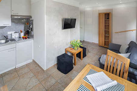 Wohnraum Fewo 19, Appartementhaus am Kurpark