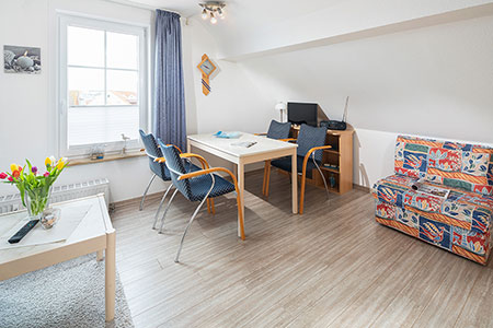 Wohnraum Fewo 28, Appartementhaus am Kurpark