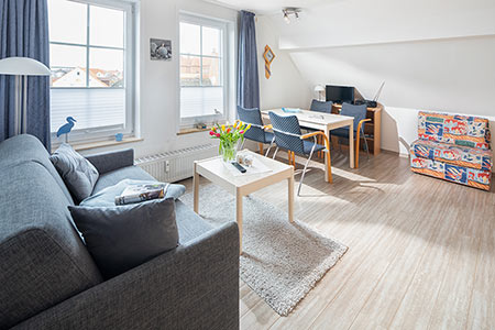 Wohnraum Fewo 28, Appartementhaus am Kurpark