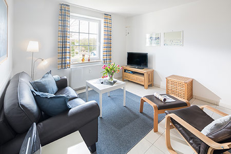 Wohnraum Ferienwohnung 29, Appartementhaus am Kurpark