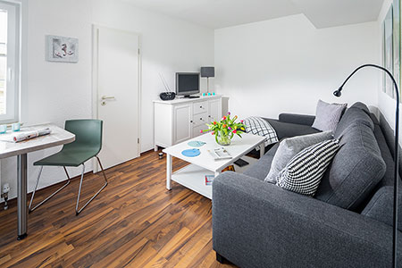 Wohnraum Fewo 31, Appartementhaus am Kurpark