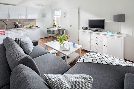 Wohnraum Fewo 31, Appartementhaus am Kurpark