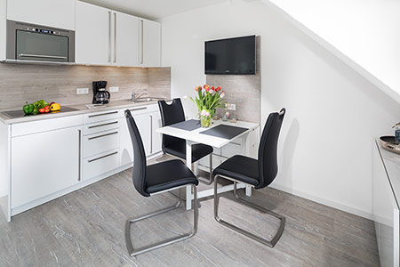 Wohnraum Fewo 34, Appartementhaus am Kurpark