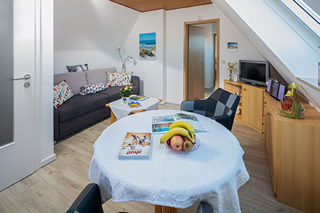 Wohnraum Ferienwohnung Dünenrose, Ferienhaus Schipper